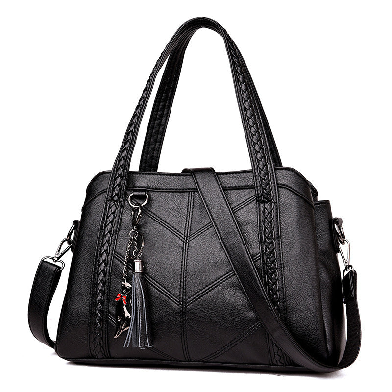 Elegante koreanische Schultertasche aus weichem Leder. Große Kapazität, leicht & vielseitig – ideal für Alltag, Büro und Reisen.

