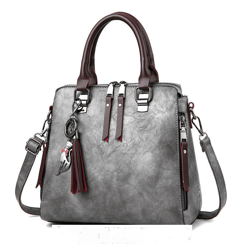 Vintage Damen Handtasche – PU Leder Tote mit Quaste & großer Kapazität NOOR08