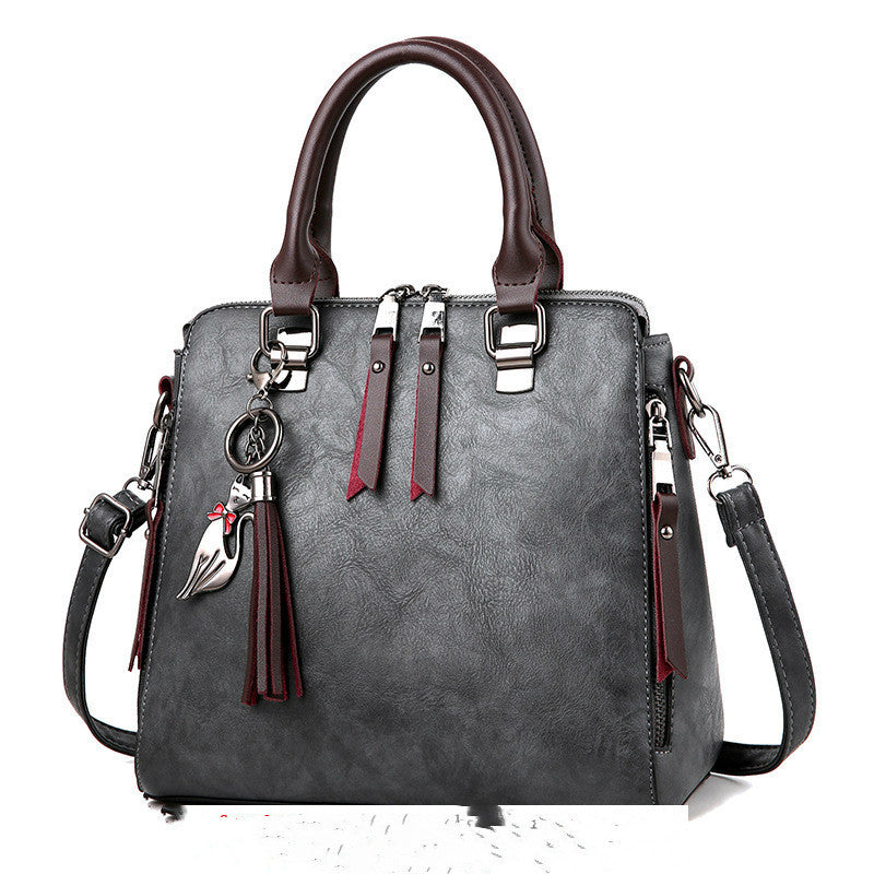 Vintage Damen Handtasche – PU Leder Tote mit Quaste & großer Kapazität NOOR08