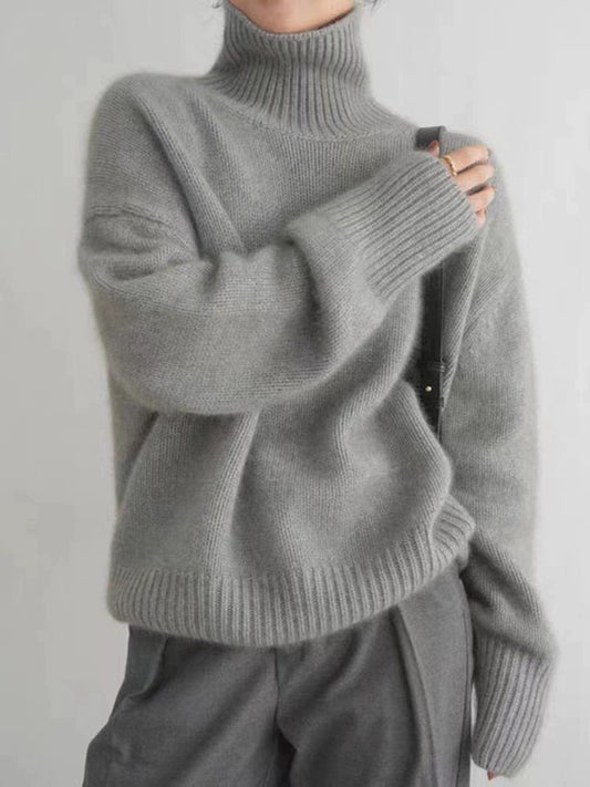 Weicher Damen Strickpullover im zeitlosen Design. Lässt sich vielseitig kombinieren, ideal für Alltag, Büro und Freizeit.
