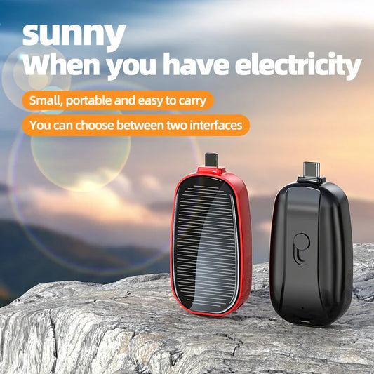 Kompakte, tragbare Powerbank mit Solarpanel und 1200mAh. Ideal als Notfall-Ladegerät für Outdoor & Camping.