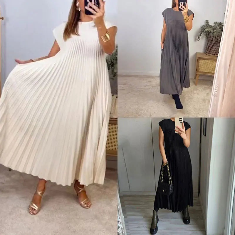 Elegantes Sommerkleid mit Rundhalsausschnitt und kurzen Ärmeln. Unifarbenes, lockeres Design für entspannte Anlässe. Ein lässiges und stilvolles Kleidungsstück.

