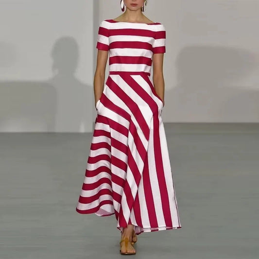 Ein neues, trendiges Kleid im Übersee-Stil. Auffälliges Streifenmuster mit One-Shoulder-Design und kurzen Ärmeln. Knöchellang für einen bequemen und modischen Look.

