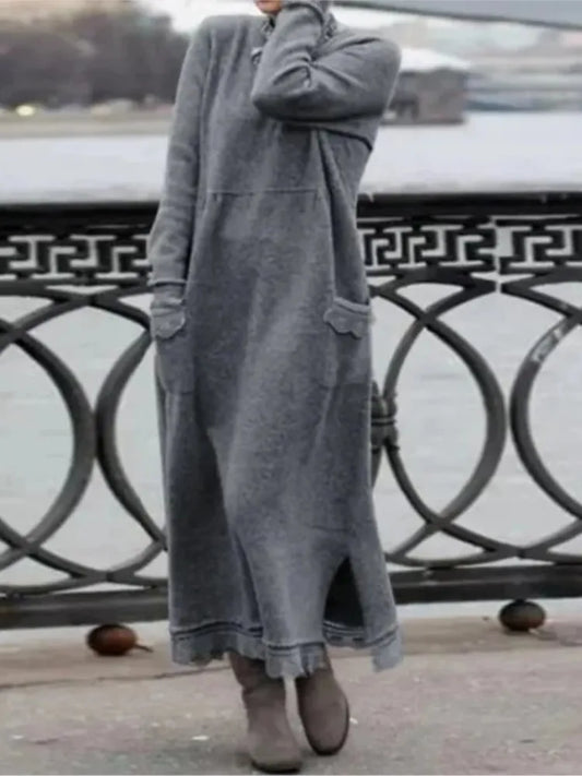 Neues langes, lockeres Maxi-Kleid für Herbst und Winter. Mit elegantem Blumen-Spitzenrand, Taschen und unifarbenem Design. Lässig und stilvoll.

